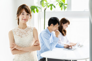 portrait of young asian group in office