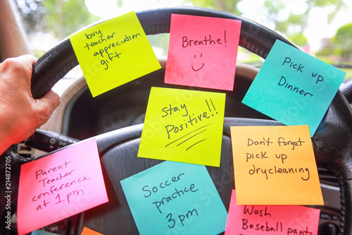 Fotografie, Obraz Steering wheel covered in notes as a reminder of errands to do
