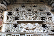 Ornate Perforated Window. A Sculpture Of Lord Vishnu With His Consort, Lakshmi. Chennakeshava Temple, Belur, Karnataka.
