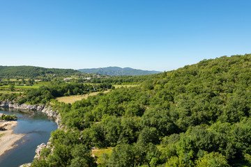 Beautiful view of the river Ardeche, framed by forests and gorges at 