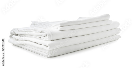 Fotografía Stack of clean bed sheets on white background