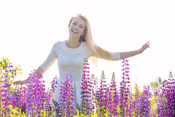 The girl is running across the field