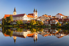 View Of Telc Across Pond With Reflections, Southern Moravia, Czech Republic.
