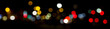 © sdecoret - Bokeh traffic light at night in the street of a big city