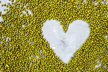 Wall Mural - Mung beans texture background with heart