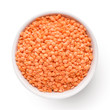 Bowl of red lentil isolated