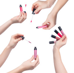 Wall Mural - Set of female hands with lipsticks on white background