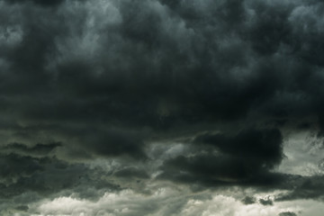Wall Mural - storm clouds dramatic with black clouds and moody sky, motion dark sky before rainy
