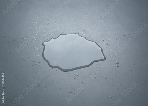 Fotomural Liquid or water drops splash on the floor , Dark color tone, abstract background