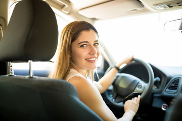 Beautiful woman driving her car