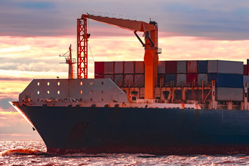 Blue container ship underway