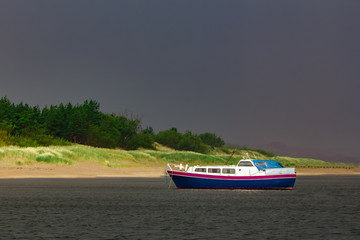 Wall Mural - Small blue passenger ship