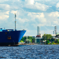 Canvas Print - Blue cargo ship underway