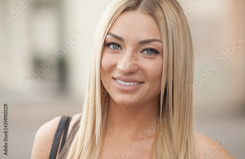 A Portrait Of A Beautiful Blonde Young Caucasian Woman