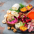© aamulya - Assortment of spanish tapas or italian antipasti with hummus
