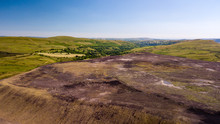 Aerial Drone View Of A Large, Buried Landfill Dump Site In Wales