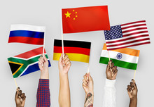 Hands Waving Flags Of China, Germany, India, South Africa, And Russia