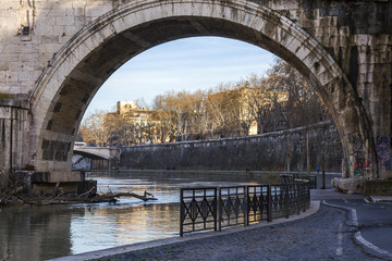 Wall Mural - ROME, ITALY, on March 11, 2017. View of Tiber and its embankments. Ponte Sisto - the pedestrian bridge connecting the right coast of Tiber and the Region of Trastevere