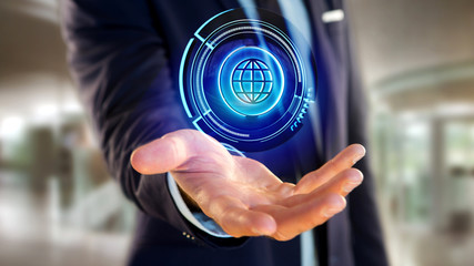 Poster - Businessman holding a Shinny technologic globe button - 3d render