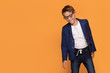 © neonshot - Smiling young elegant boy in eyeglasses.
