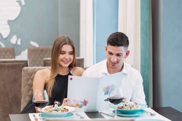 Wall Mural - Beautiful couple in a restaurant