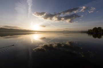 Wall Mural - Sunrise at Lake Sempach in Switzerland. In the background Mount Rigi