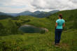 © Evgeniya brjane - A young woman admires the Lake of Love in Arkhyz.