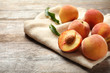 Fresh sweet peaches on wooden table. Natural fruit