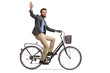 Bearded man riding a bicycle and waving at the camera