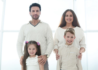 Wall Mural - portrait of a happy family with small children