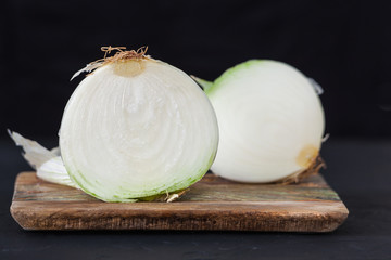 whole white onion two parts 