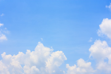 Wall Mural - fluffy cloud against blue sky background