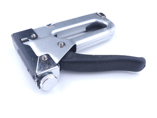 construction stapler on white background