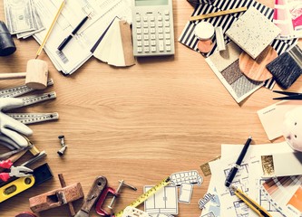 Flat lay of various technician tools isolated