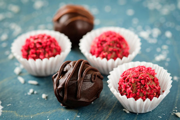 Wall Mural - appetizing truffles on a wooden background