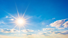 Hot Summer Or Heat Wave Background, Blue Sky With Glowing Sun