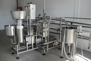 Industrial separator in dairy production. Separator complete with centrifugal pump. Technological equipment for milk processing