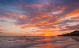 Fototapeta Zachód słońca - Colorful clouds in sunrise over Atlantic Ocean