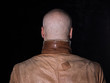 © serikbaib - studio portrait of a bald man on a black background