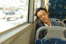 Man Sleeping In The Bus