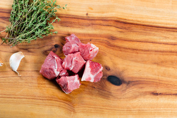 Wall Mural - Raw diced beef on chopping board