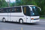 Fototapeta  - tourist bus rides on the highway