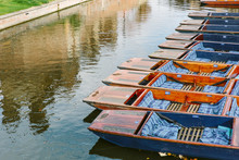 Punts Lined Up On The River In Cambridge, England.