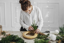 Woman Making A Christmas Wreath