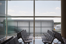 Airport Hall With Empty Seats And Big Window With A View