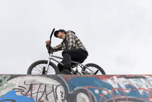 Man On BMX?on Graffiti Wall