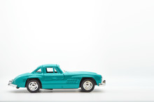 Little Ancient Model Toy Car Isolated On Background.