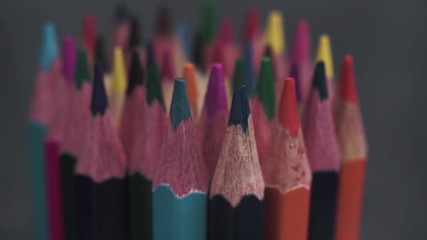 Poster - Colored pencils, rotation 360 degrees. Dark bacground. Macro view.