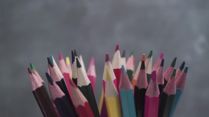 Aufkleber - Colored pencils, rotation 360 degrees. Dark bacground. Macro view.