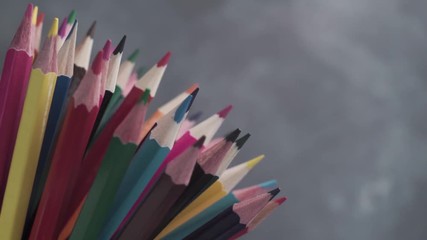 Aufkleber - Colored pencils, rotation 360 degrees. Dark bacground. Macro view.